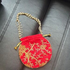 Elegant Red Embroidered Pouch